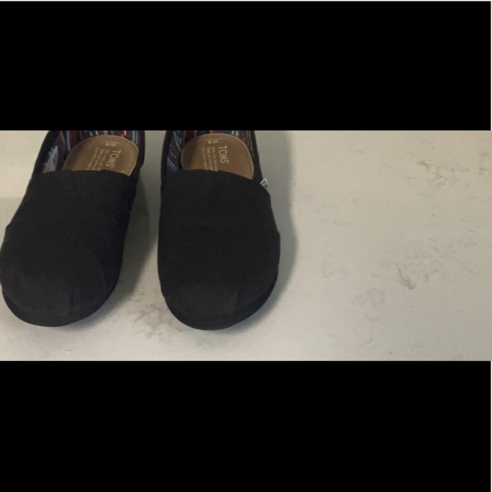 Toms Classic Black on Black Canvas WO slip ones